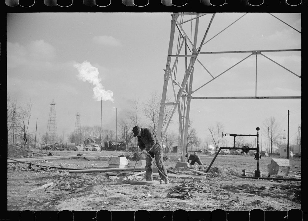 [Untitled photo, possibly related to: Oil field worker, Marion County, Illinois]. Sourced from the Library of Congress.