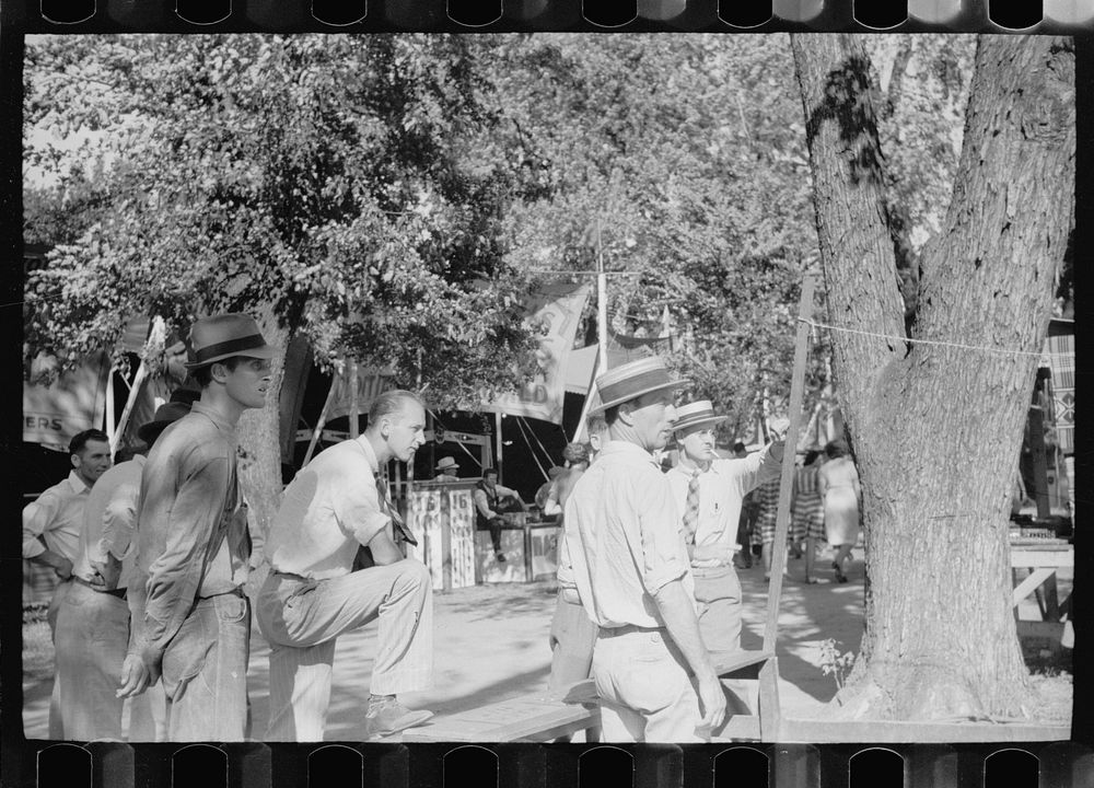 [Untitled photo, possibly related to: Baseball throwing concession, Central Iowa 4-H Club fair, Marshalltown, Iowa]. Sourced…