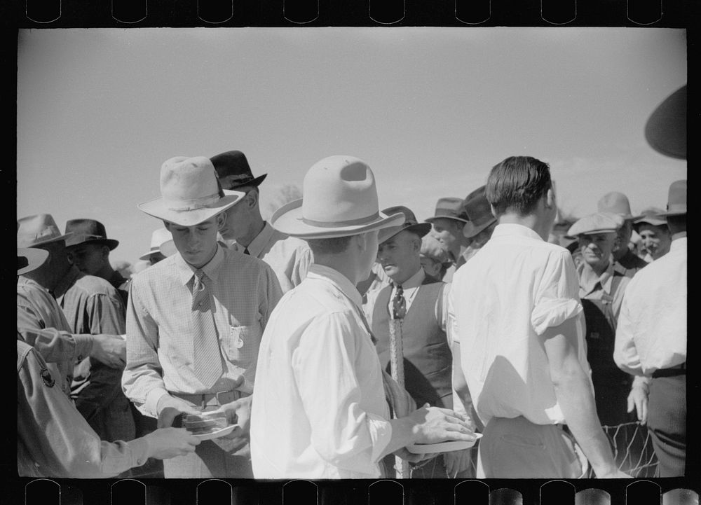 [Untitled photo, possibly related to: Farmers eating lunch, U.S. Dry Land Experiment Station, Akron, Colorado]. Sourced from…