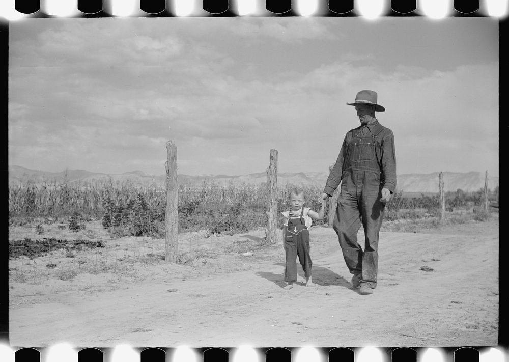 [Untitled photo, possibly related to: Thomas W. Beede, resettlement client, Western Slope Farms, Colorado poses with his…