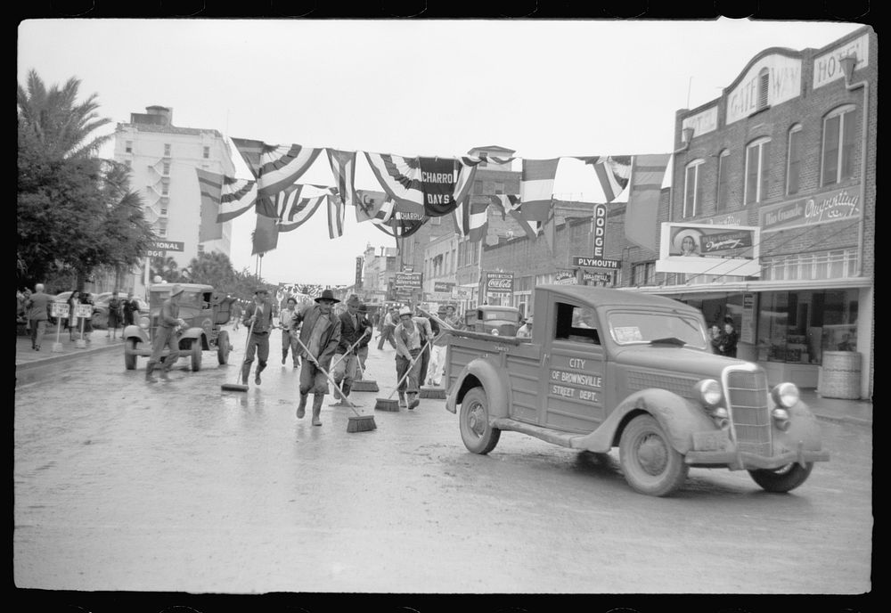 [Untitled photo, possibly related to: Street cleaners follow the parade, Charro Days, Brownsville, Texas]. Sourced from the…