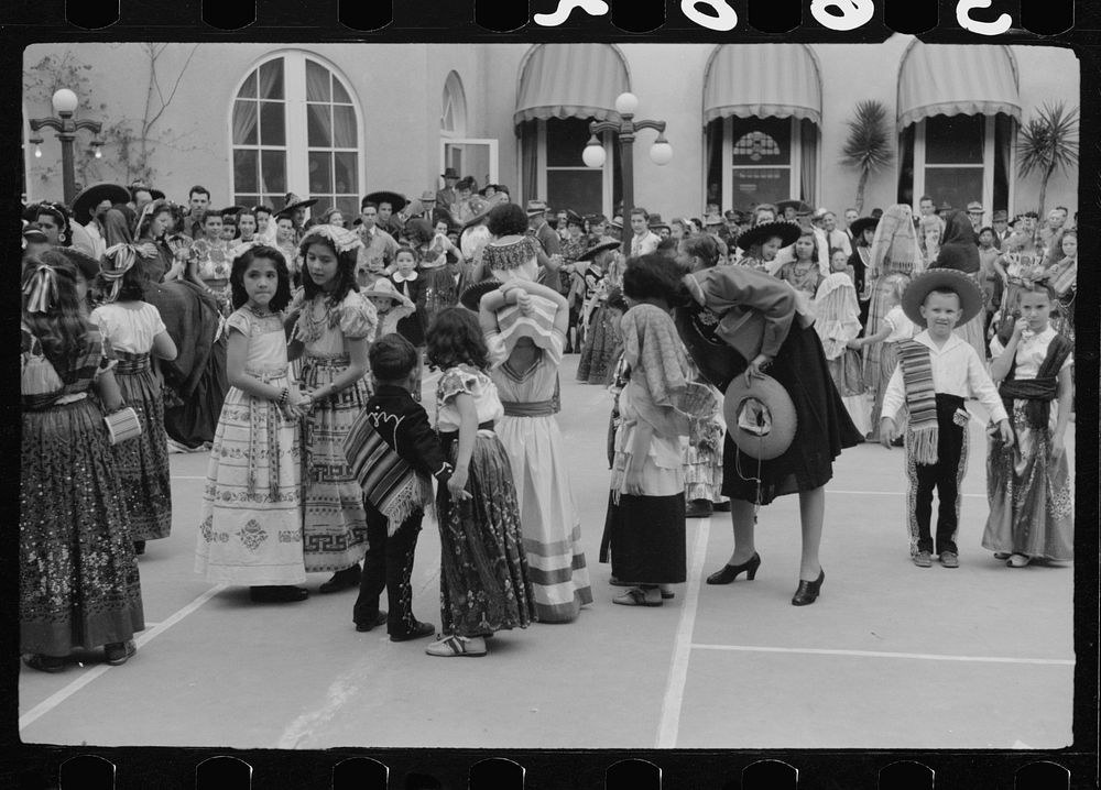 [Untitled photo, possibly related to: Tourists at costume show, Charro Days, Brownsville, Texas]. Sourced from the Library…
