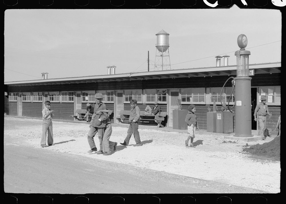 [Untitled photo, possibly related to: In front of the community store, FSA (Farm Security Administration) camp, Sinton…