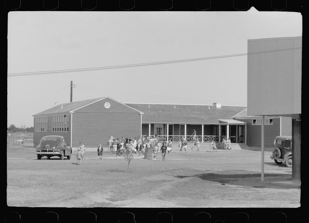 [Untitled photo, possibly related to: Noonday recess, elementary school, FSA (Farm Security Administration) camp, Weslaco…
