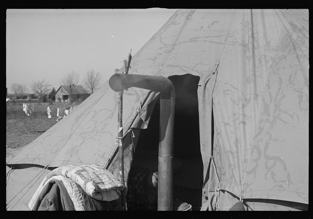 [Untitled photo, possibly related to: A street of tents in the camp for flood refugees of Forrest City, Arkansas]. Sourced…
