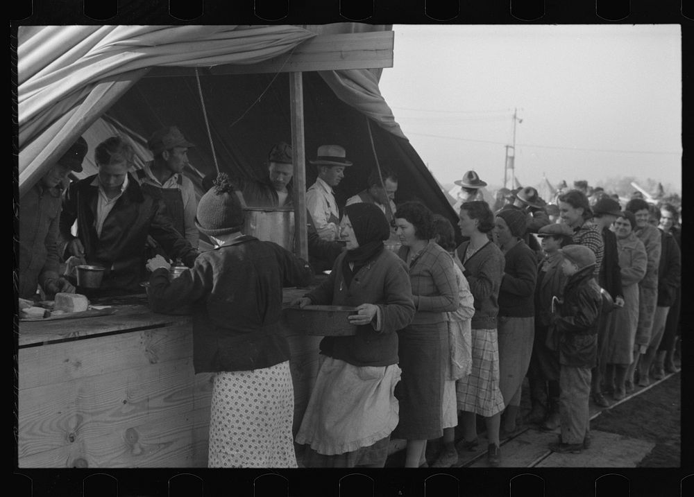 [Untitled photo, possibly related to: Line of flood refugees at mealtime in camp for white flood refugees at Forrest City…