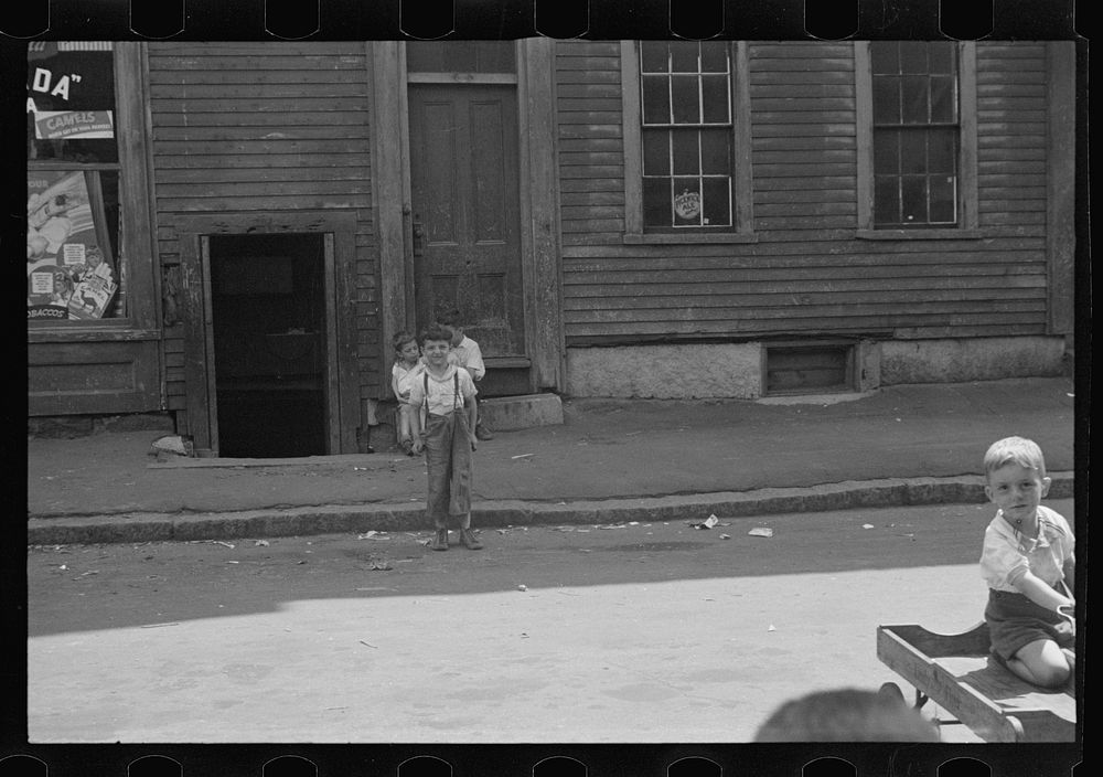 [Untitled photo, possibly related to: Children playing in street, Manchester, New Hampshire]. Sourced from the Library of…