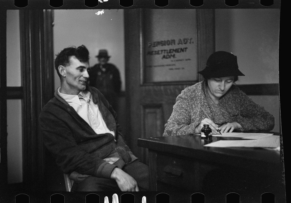 [Untitled photo, possibly related to: Rehabilitation client worrying over his accounts, Jackson County, Ohio]. Sourced from…