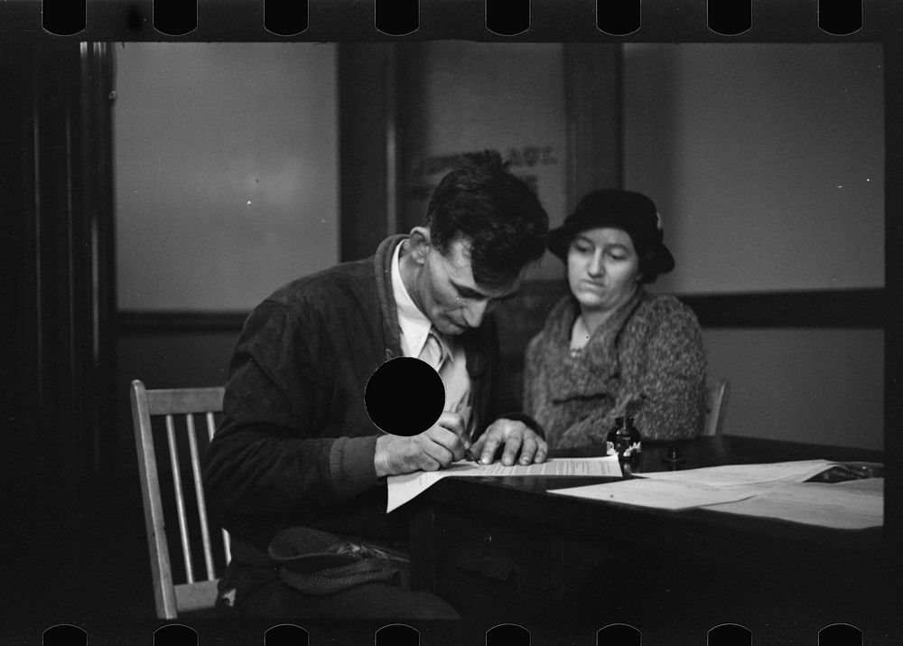 [Untitled photo, possibly related to: Rehabilitation client worrying over his accounts, Jackson County, Ohio]. Sourced from…