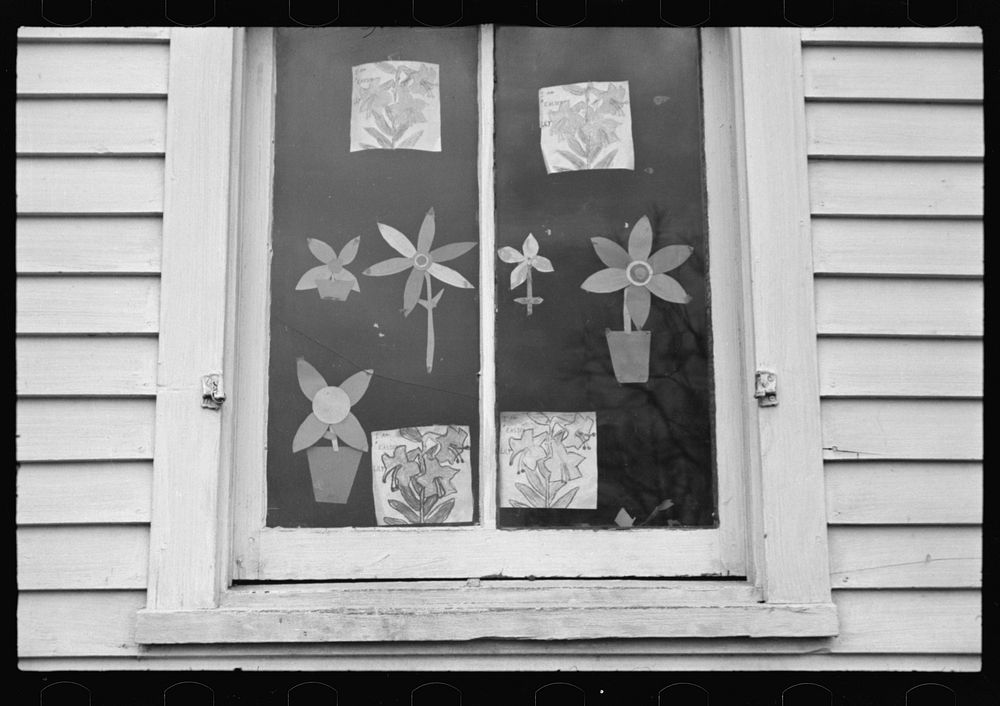 [Untitled photo, possibly related to: Children's art work in window of school, Jackson, Ohio]. Sourced from the Library of…