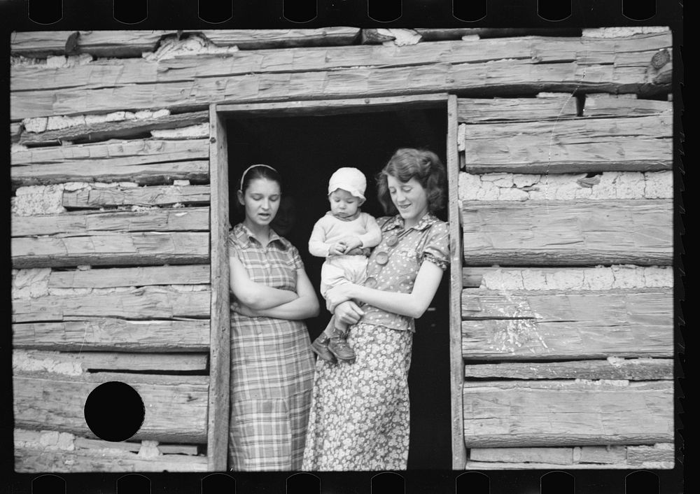[Untitled photo, possibly related to: Mother of family of five to be resettled on Ross-Hocking Land Project near…