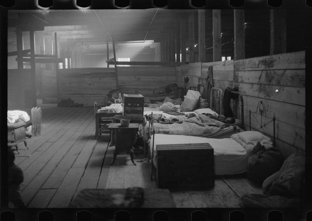 Interior of cotton compress where sick  flood refugees are housed during the flood, Forrest City, Arkansas. Sourced from the…