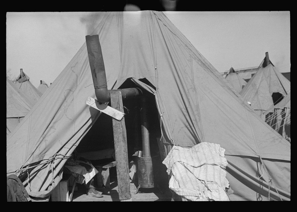 [Untitled photo, possibly related to: A  flood refugee family who, with their rescued household goods have moved into the…