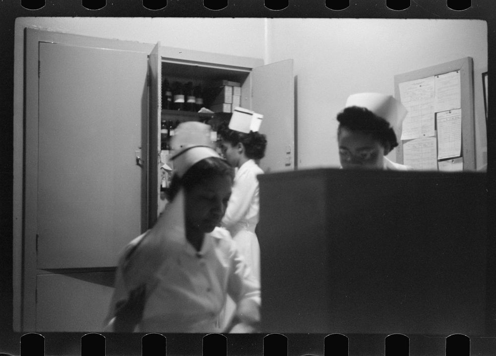 [Untitled photo, possibly related to: Staff doctor entering Provident Hospital, Chicago, Illinois]. Sourced from the Library…