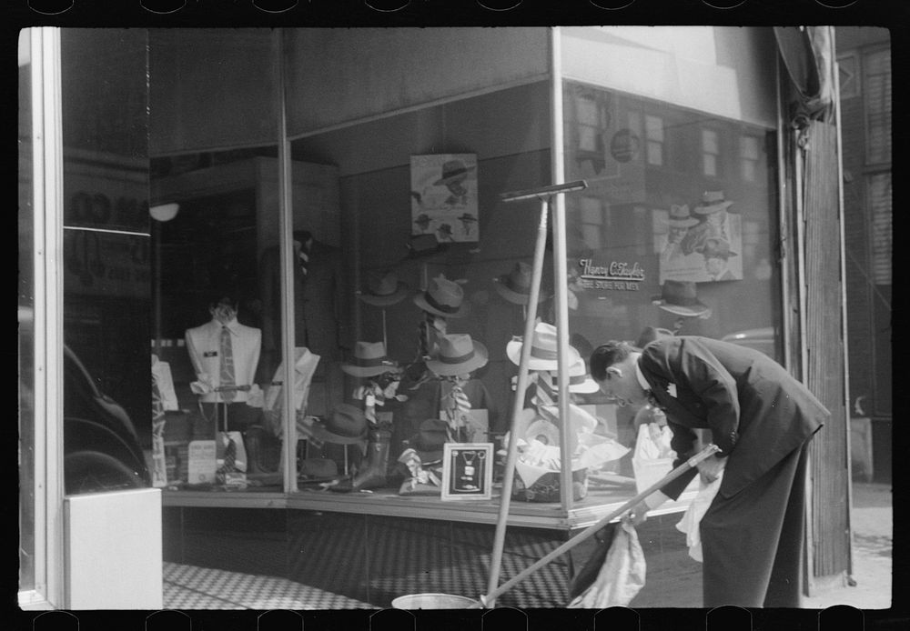 [Untitled photo, possibly related to: Books on display in show store window, 47th Street, Chicago, Illinois]. Sourced from…