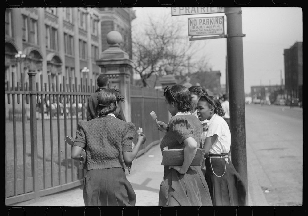 Young people outside of  high school, Black Belt, Chicago, Illinois. Sourced from the Library of Congress.