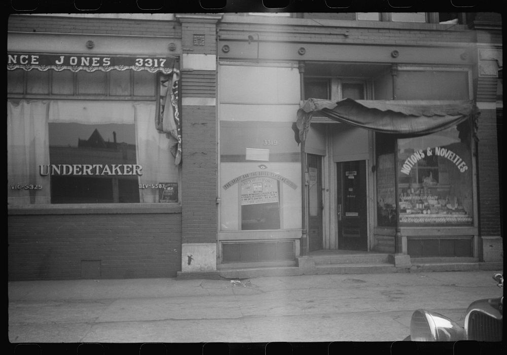 [Untitled photo, possibly related to: Street scene, Black Belt, Chicago, Illinois]. Sourced from the Library of Congress.