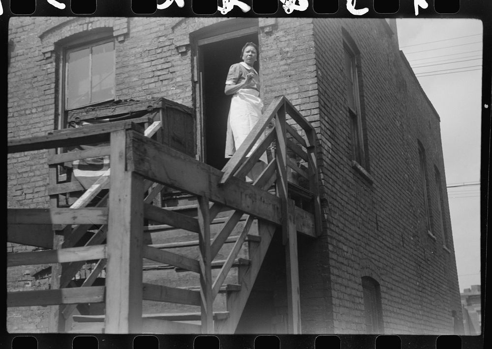 [Untitled photo, possibly related to: "Kitchenette" apartment houses, Black Belt, Chicago, Illinois]. Sourced from the…