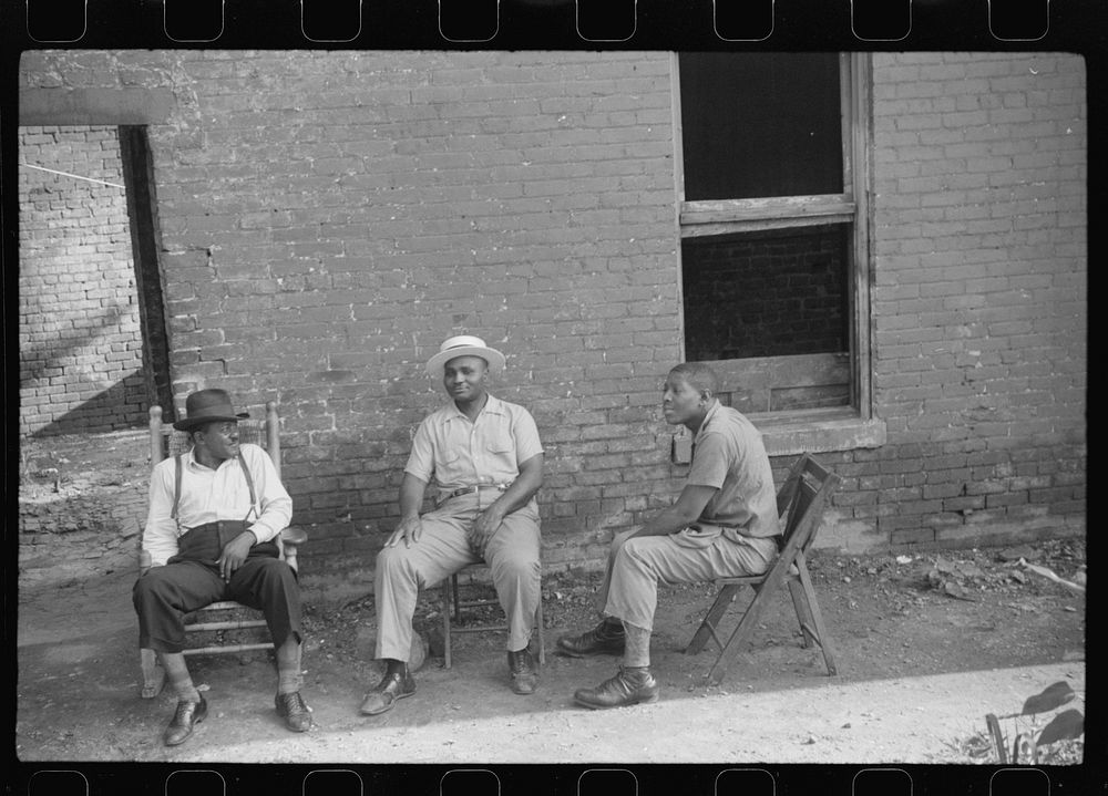 es in front of their homes in the alley dwelling area. Washington, D.C.. Sourced from the Library of Congress.
