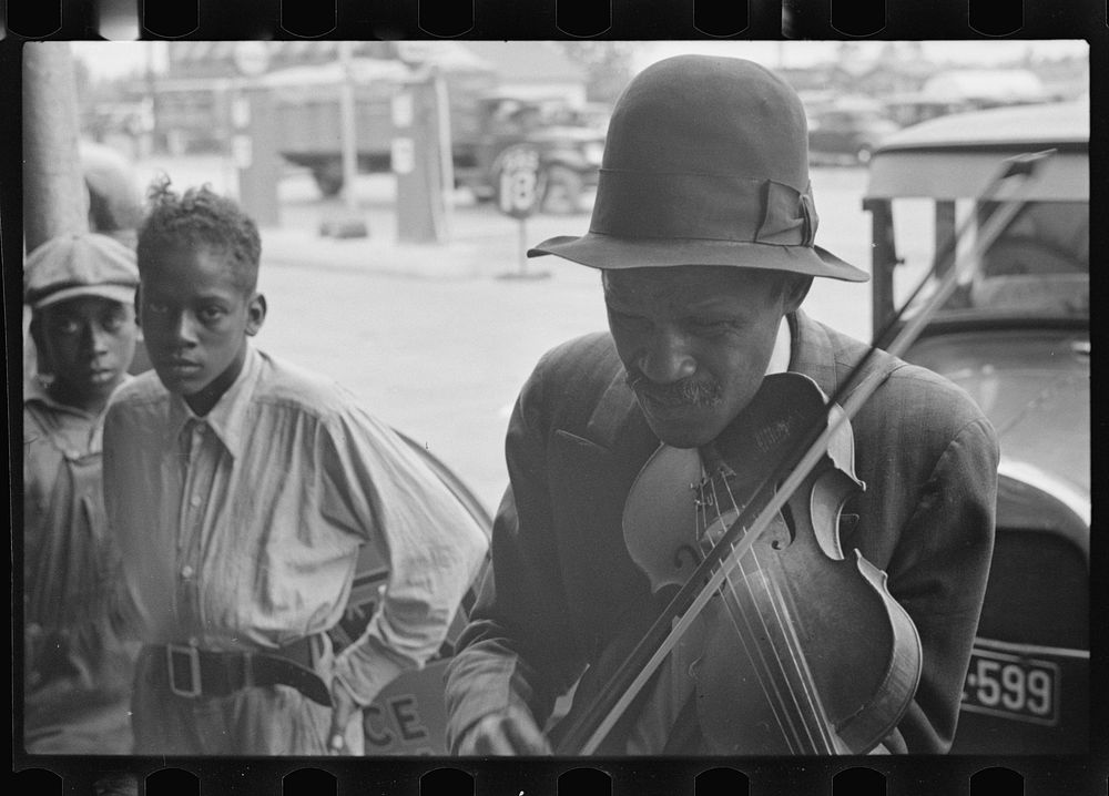 [Untitled photo, possibly related to: Blind street musician, West Memphis, Arkansas]. Sourced from the Library of Congress.