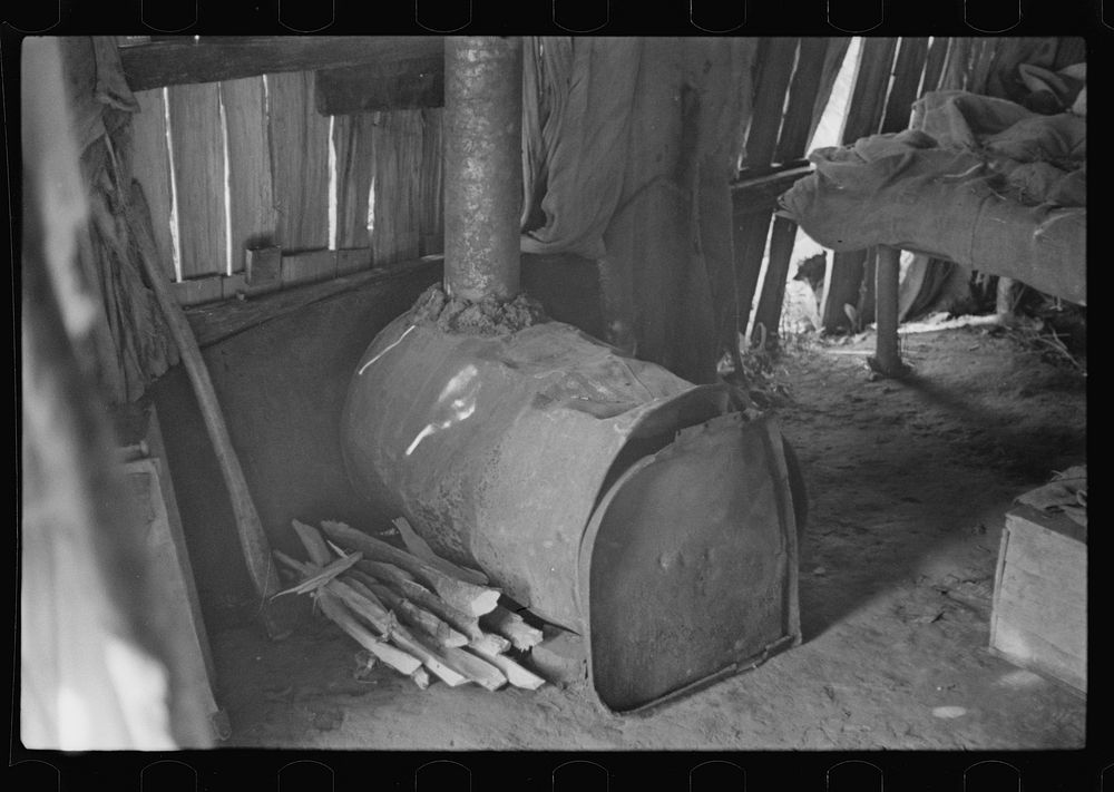 Stove made out of old oil can, squatter's camp, Arkansas. Sourced from the Library of Congress.