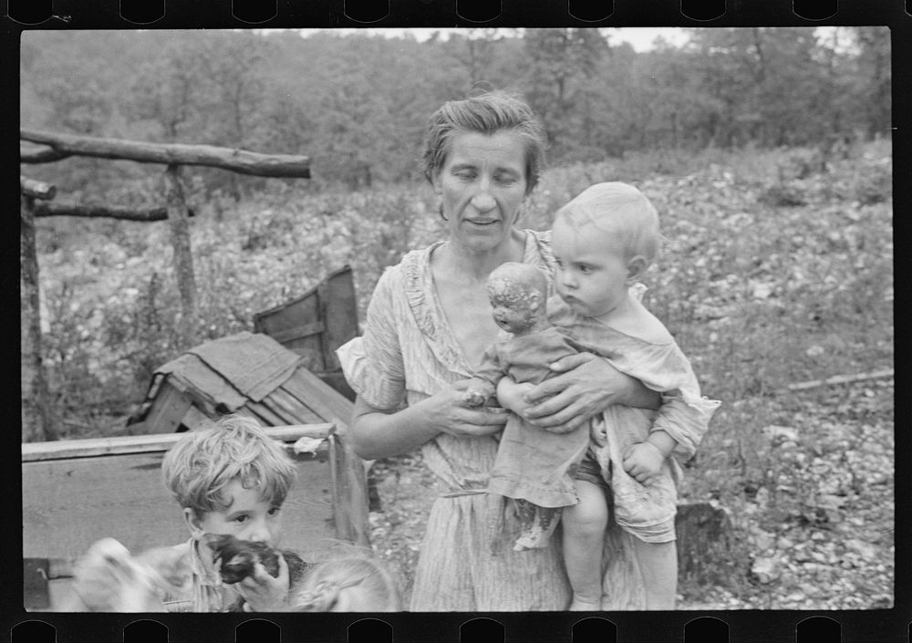 [Untitled photo, possibly related to: Wife and child of sharecropper, Arkansas]. Sourced from the Library of Congress.