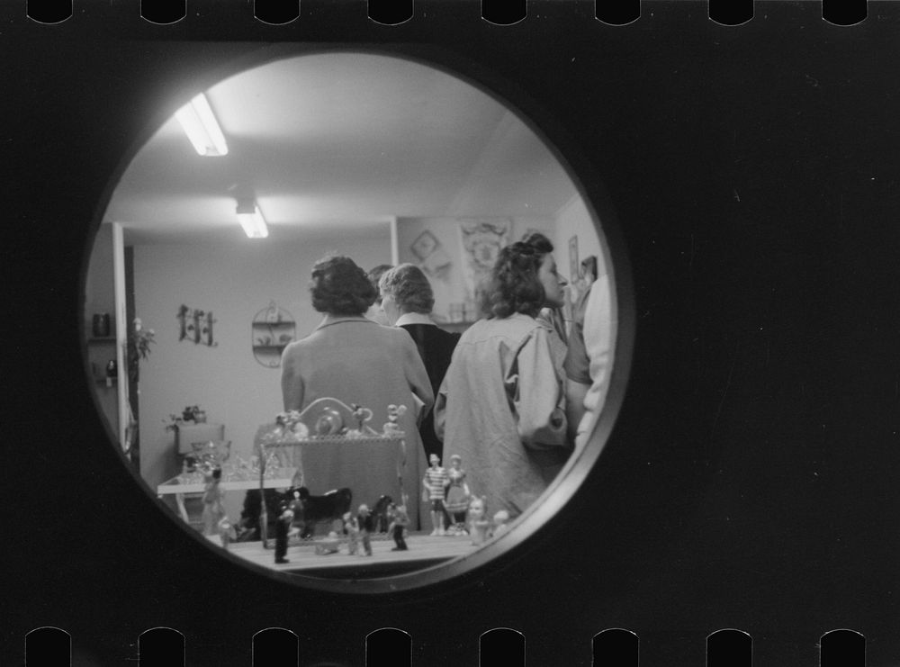 Shoppers at night in souvenir store, Provincetown, Massachusetts. Sourced from the Library of Congress.