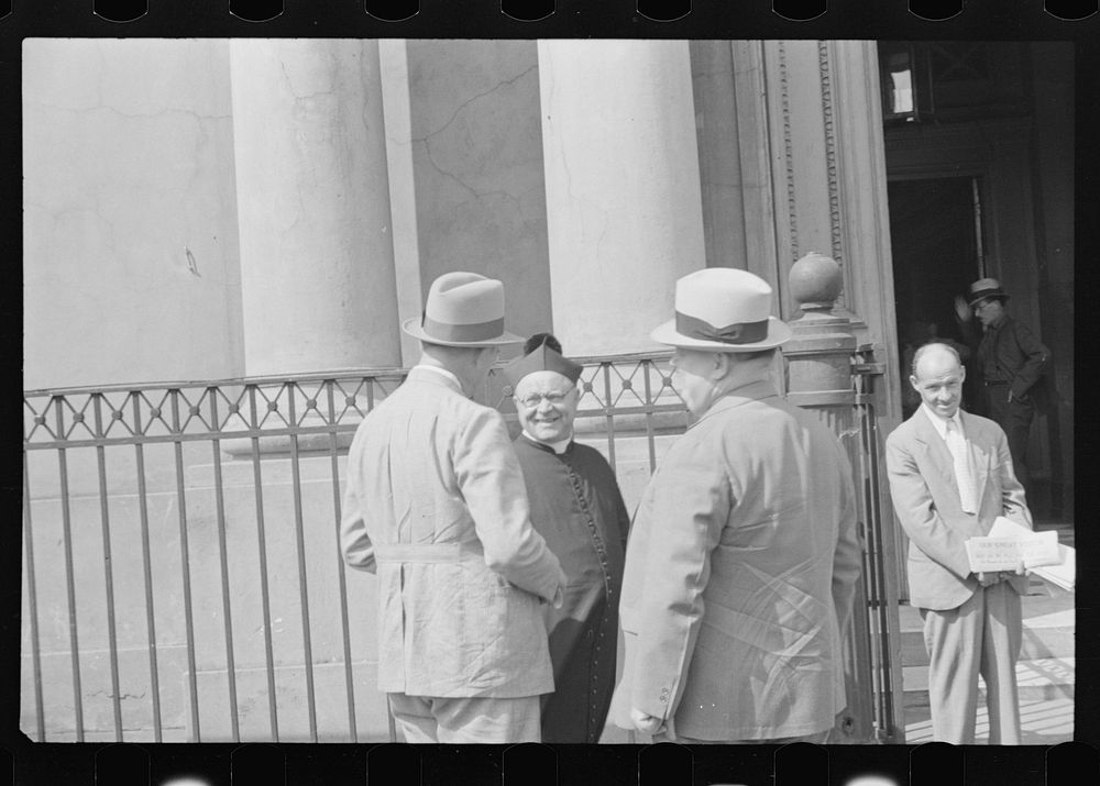 In front of cathedral, New Orleans, Louisiana. Sourced from the Library of Congress.