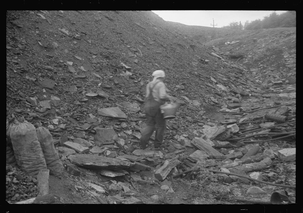 [Untitled photo, possibly related to: Young boy who salvages coal from the slag heaps, Nanty Glo, Pennsylvania]. Sourced…