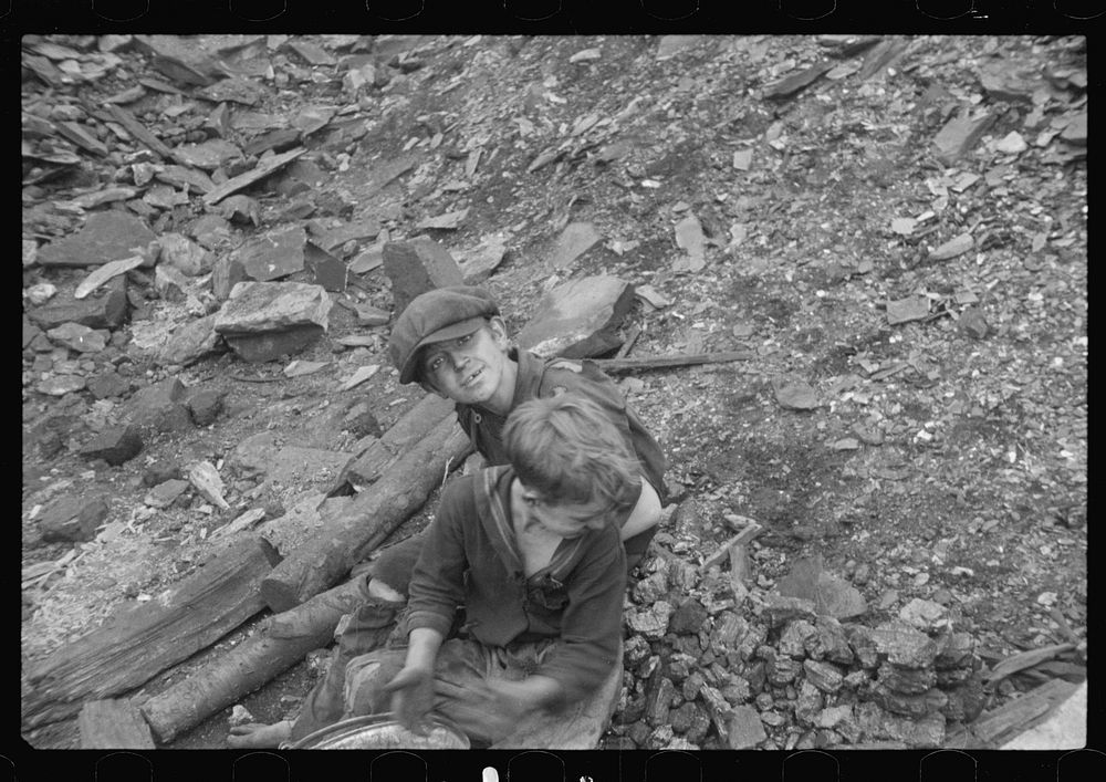 Young boys salvaging coal from the slag heaps, Nanty Glo, Pennsylvania. Sourced from the Library of Congress.