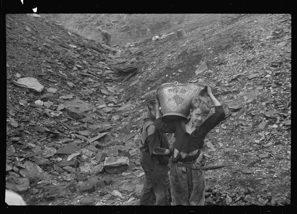 [Untitled photo, possibly related to: Young boys salvaging coal from the slag heaps, Nanty Glo, Pennsylvania]. Sourced from…
