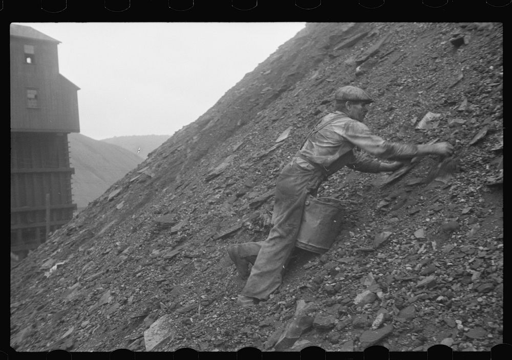 Man gathering good coal from the slag heaps at Nanty Glo, Pennsylvania. Sourced from the Library of Congress.