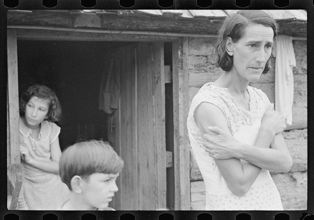 Boone County, Arkansas. The family of a Resettlement Administration client in the doorway of their home. Sourced from the…