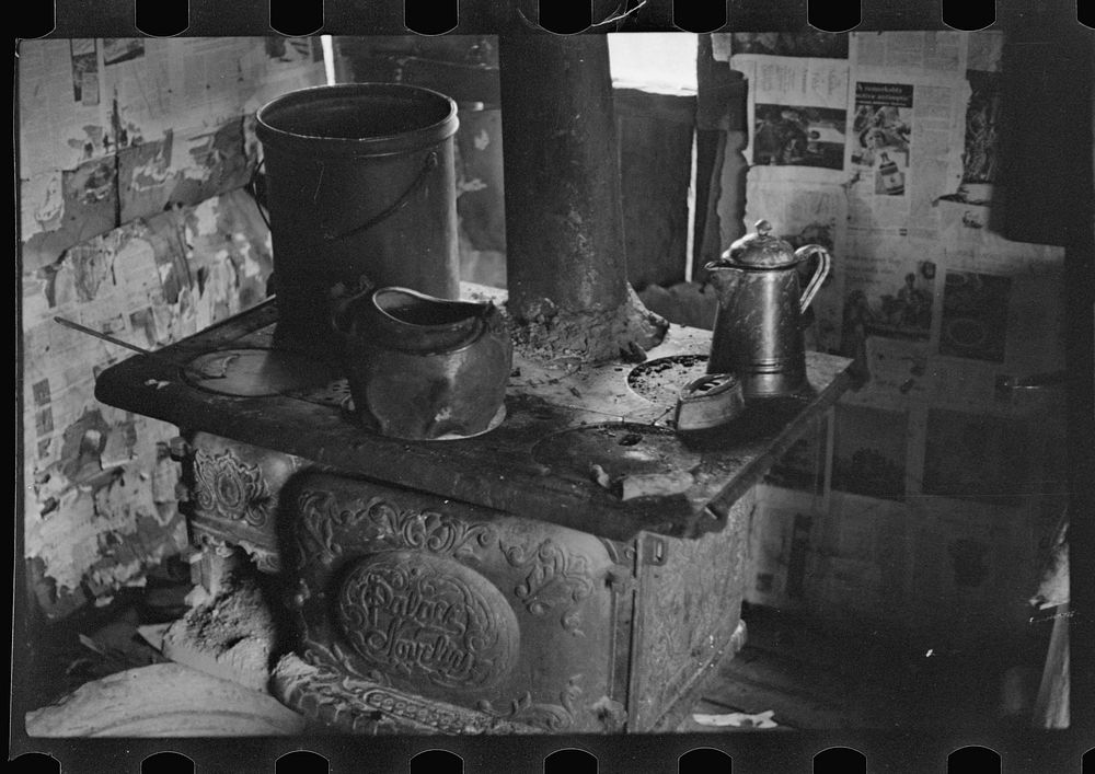 Stove in home of destitute Ozark family, Arkansas. Sourced from the Library of Congress.