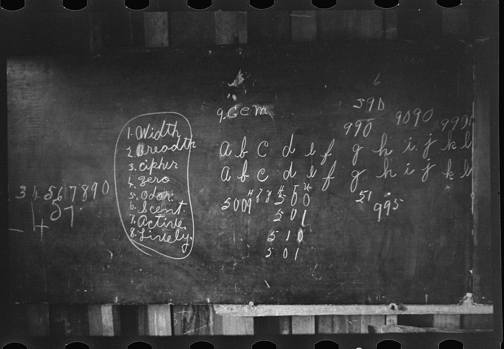 Blackboard in Ozark school, Arkansas. Sourced from the Library of Congress.