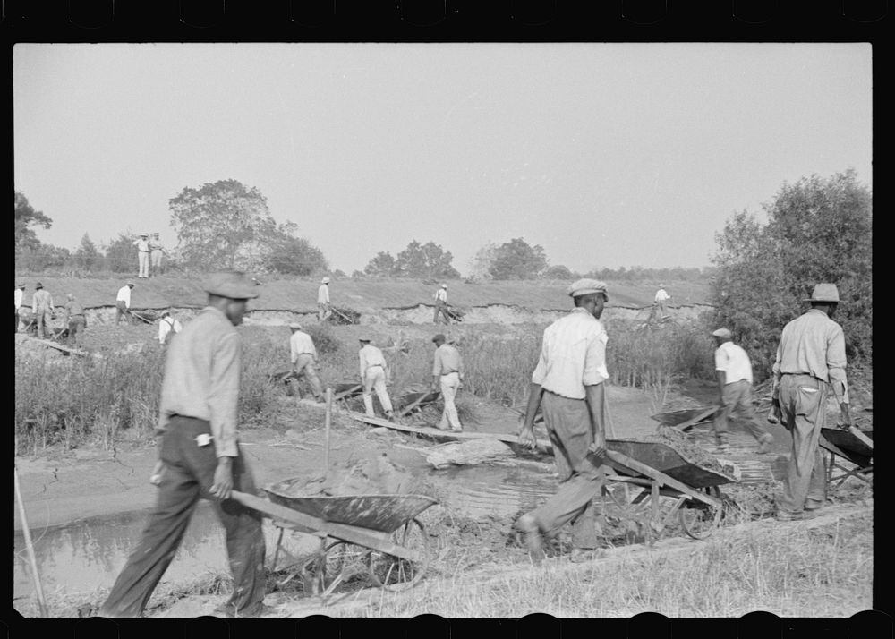 [Untitled photo, possibly related to: Levee workers, Plaquemines Parish, Louisiana]. Sourced from the Library of Congress.