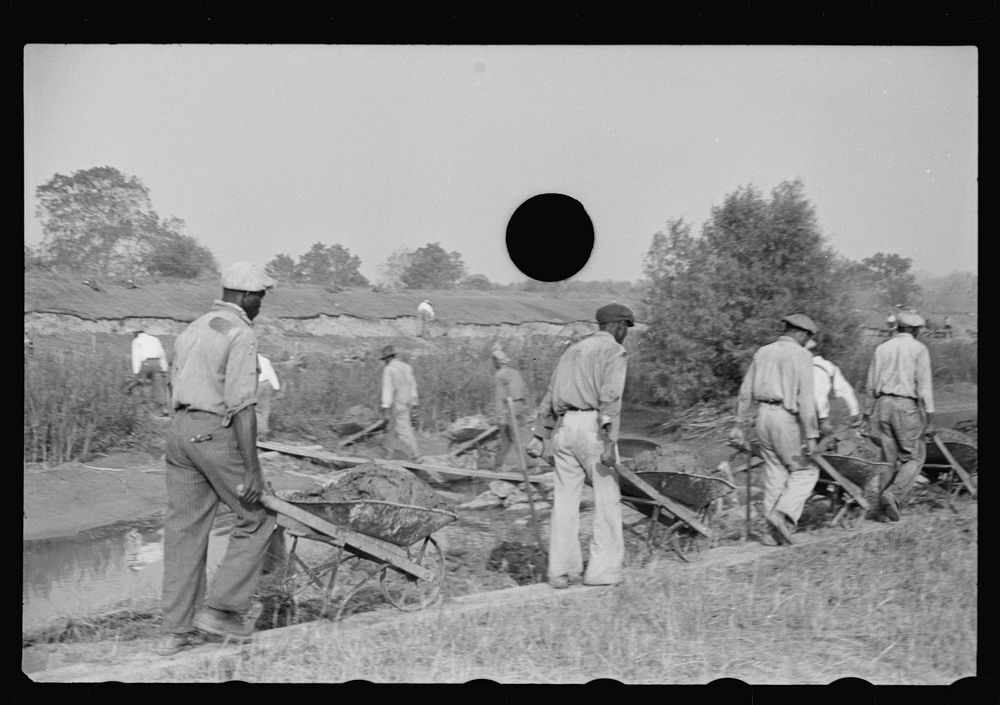 [Untitled photo, possibly related to: Levee workers, Plaquemines Parish, Louisiana]. Sourced from the Library of Congress.