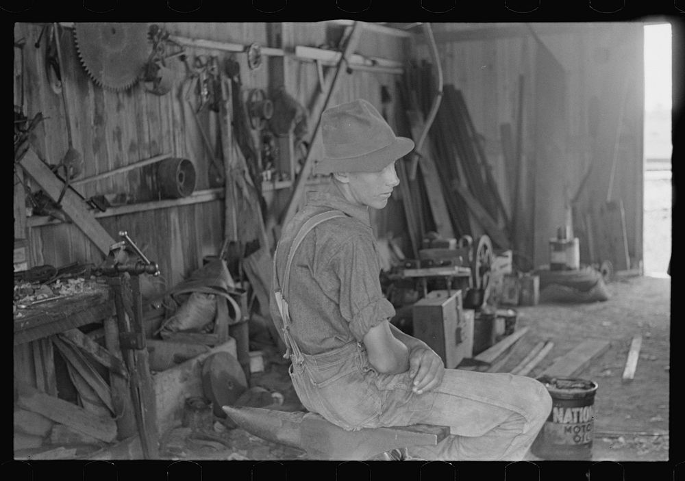 Wheat harvest hand in tool shed, central Ohio. Sourced from the Library of Congress.