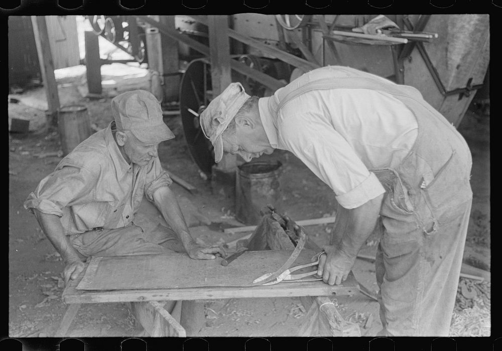 Repairing the thresher, central Ohio. Sourced from the Library of Congress.