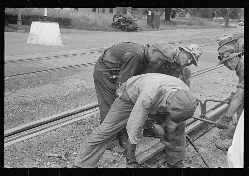 [Untitled photo, possibly related to: Working on track, London, Ohio (see general caption)]. Sourced from the Library of…