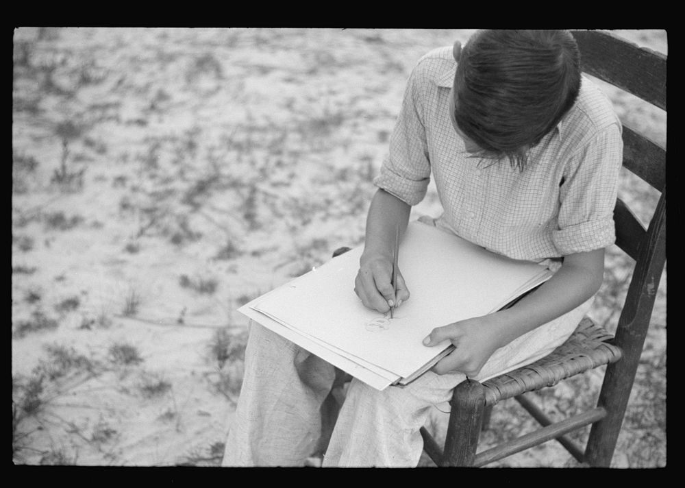 Boy drawing, Penderlea Homesteads, North Carolina. Sourced from the Library of Congress.
