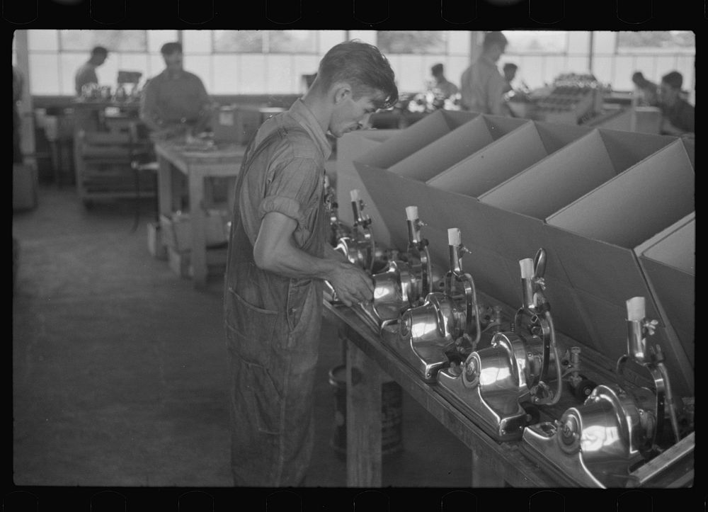 [Untitled photo, possibly related to: Vacuum cleaner factory, Arthurdale, West Virginia]. Sourced from the Library of…