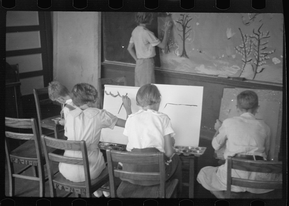 [Untitled photo, possibly related to: Painting class in school, Westmoreland Homesteads, Pennsylvania]. Sourced from the…
