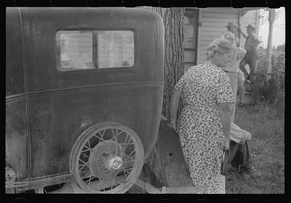 Farmer's wife watching proceedings at farm auction, New Carlisle [i.e. Marysville], Ohio. Sourced from the Library of…