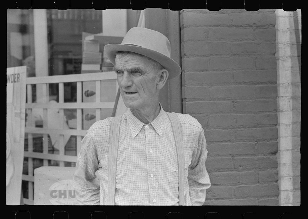 Man on street corner, Marysville, Ohio. Sourced from the Library of Congress.
