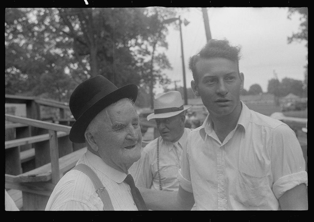 [Untitled photo, possibly related to: Attendant at county fair, central Ohio]. Sourced from the Library of Congress.