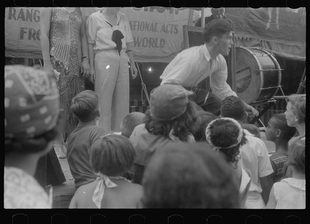 [Untitled photo, possibly related to: Selling tickets to the sideshow, county fair, central Ohio]. Sourced from the Library…