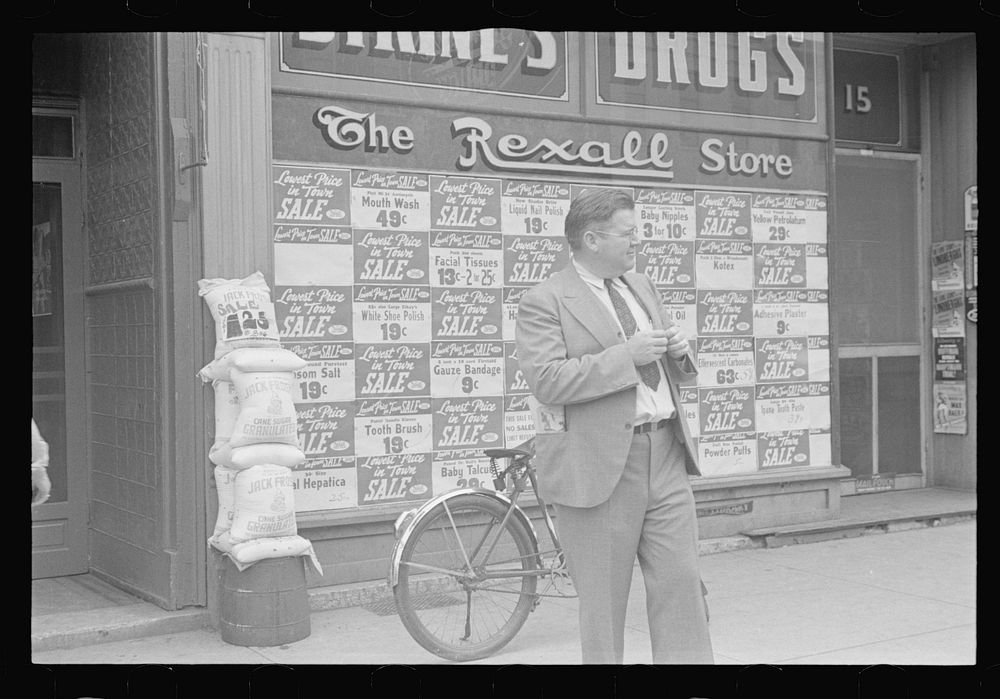 Outside a drugstore, Newark, Ohio. Sourced from the Library of Congress.