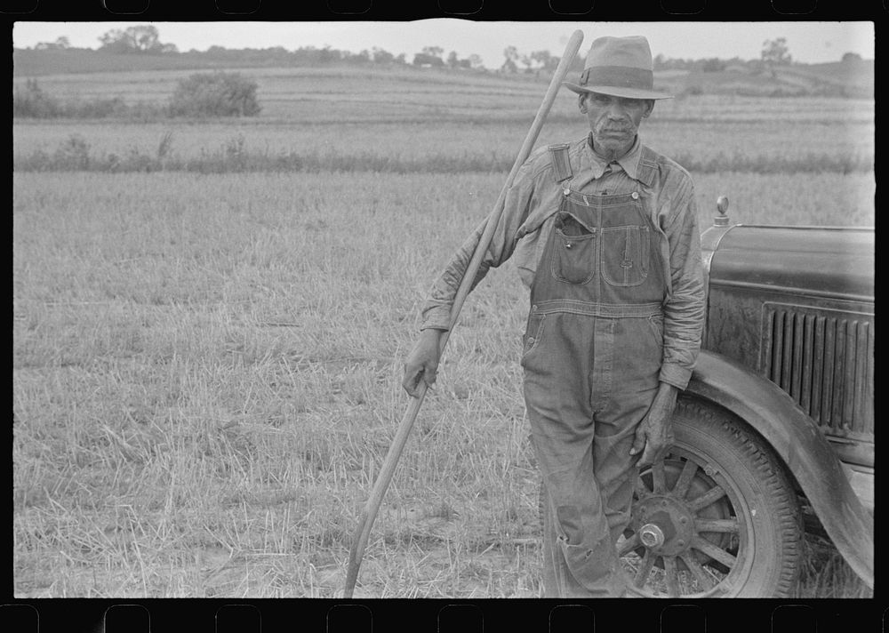 Harvest hand and helper on the Virgil Thaxton farm near Mechanicsburg, Ohio. Sourced from the Library of Congress.