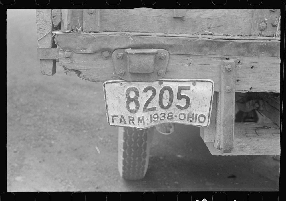 On Route 40, central Ohio moving combine and tractor (see general caption). Sourced from the Library of Congress.